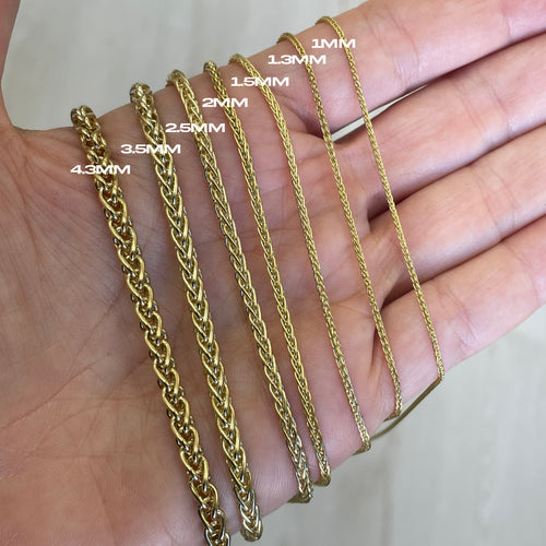 A photo of 1.3mm wheat chain solid gold 14k yellow in all sizes all made in italy