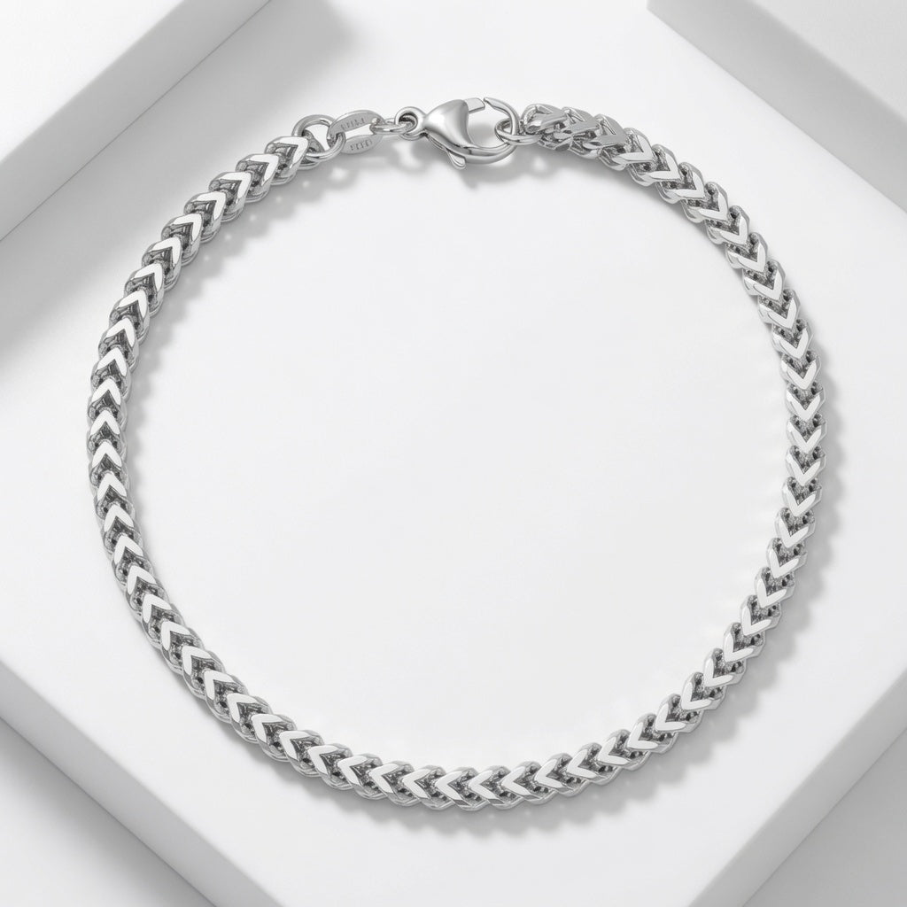 Silver braided franco bracelet on a white background