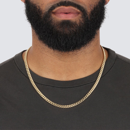 5mm baby curb chain with lobster clasp claw and two end caps made in italy solid yellow gold model wearing 22 inch