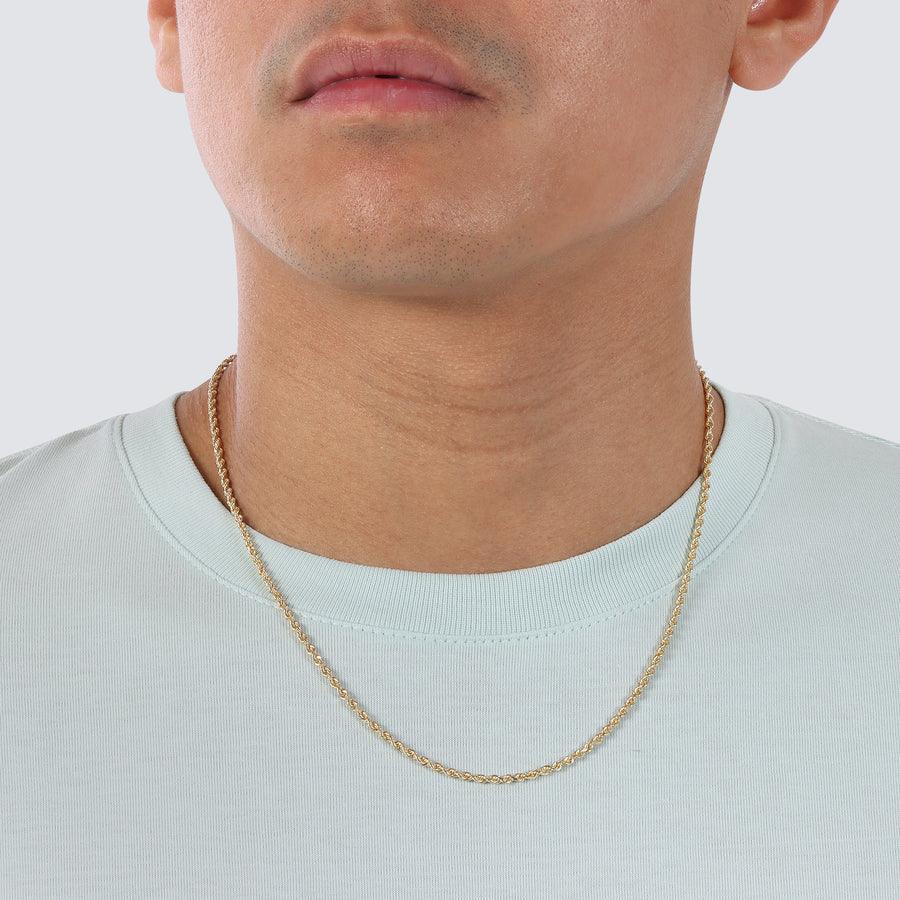 a photo of 2.5mm rope chain diamond cut in 14k, 18k and 22k solid gold on a model's neck.
