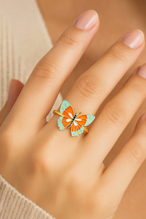 model wearing custom made gold butterfly sing with colorful enamel 14k solid gold