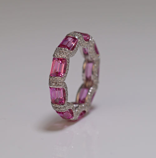 diamond studded ring with pink sapphire iced out diamond white gold