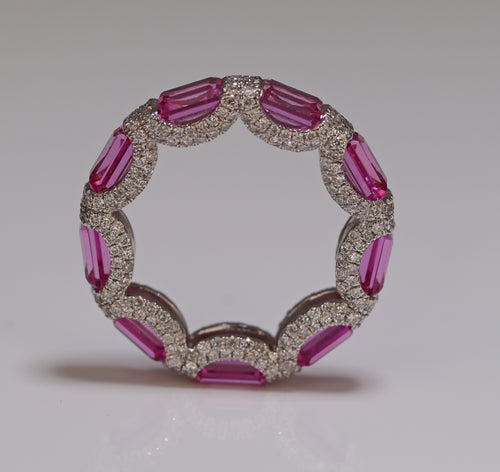 diamond studded ring with pink sapphire iced out diamond white gold