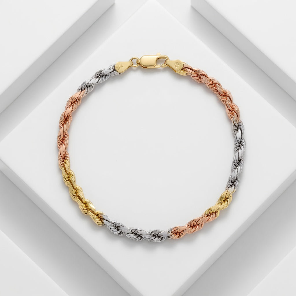 Three-tone braided rope bracelet on a white background